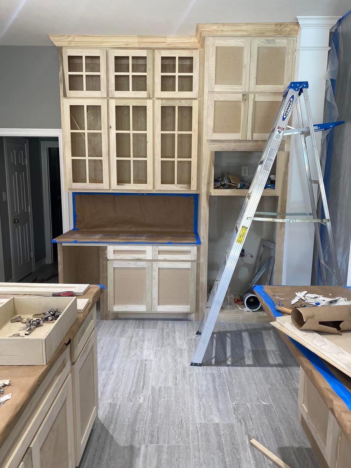 Custom built-in cabinetry in progress Custom kitchen cabinetry installation under construction in a Fort Bend County TX remodel